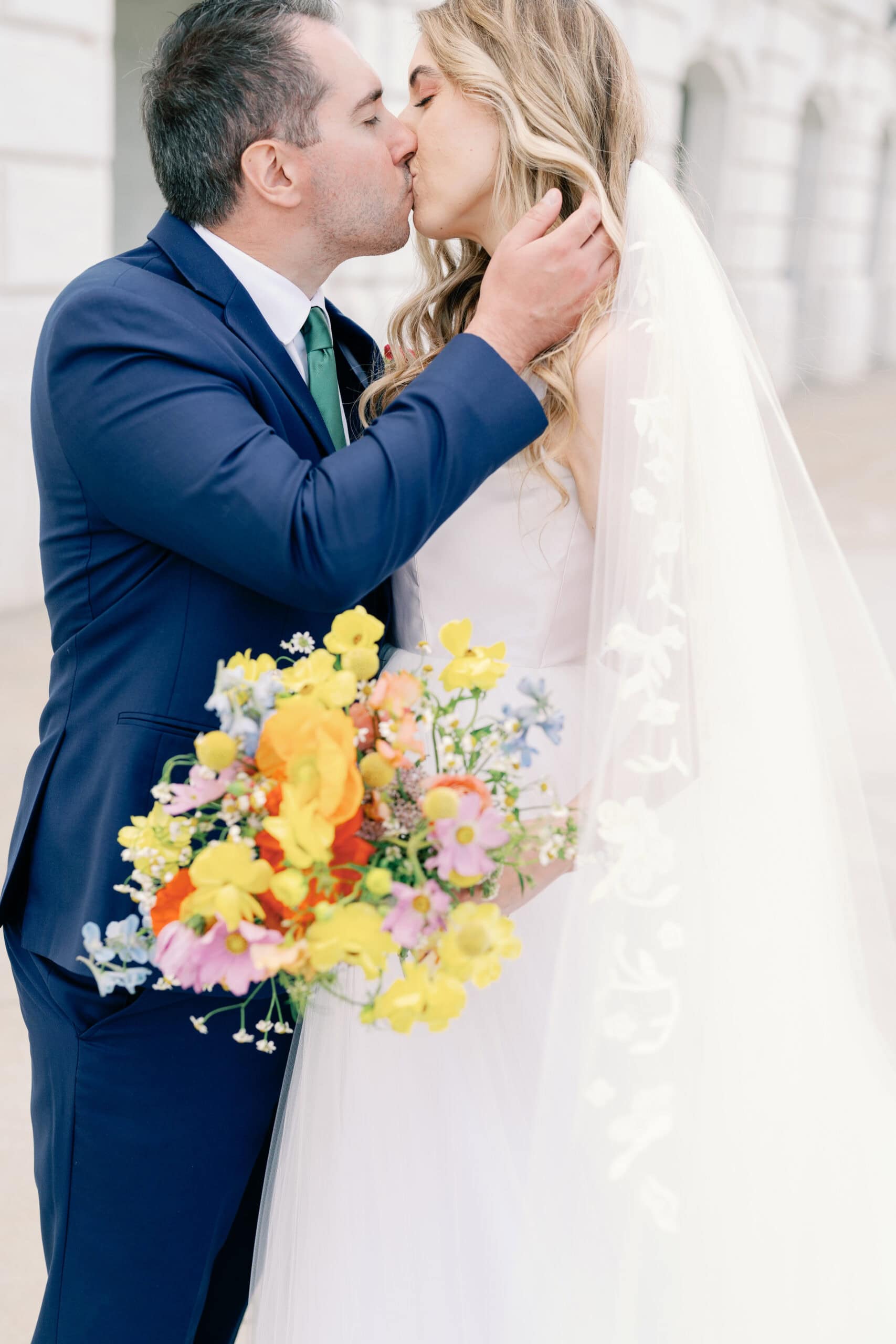 Couture Bride Ashley in Custom Sarah Kolis Gown and veil and groom 