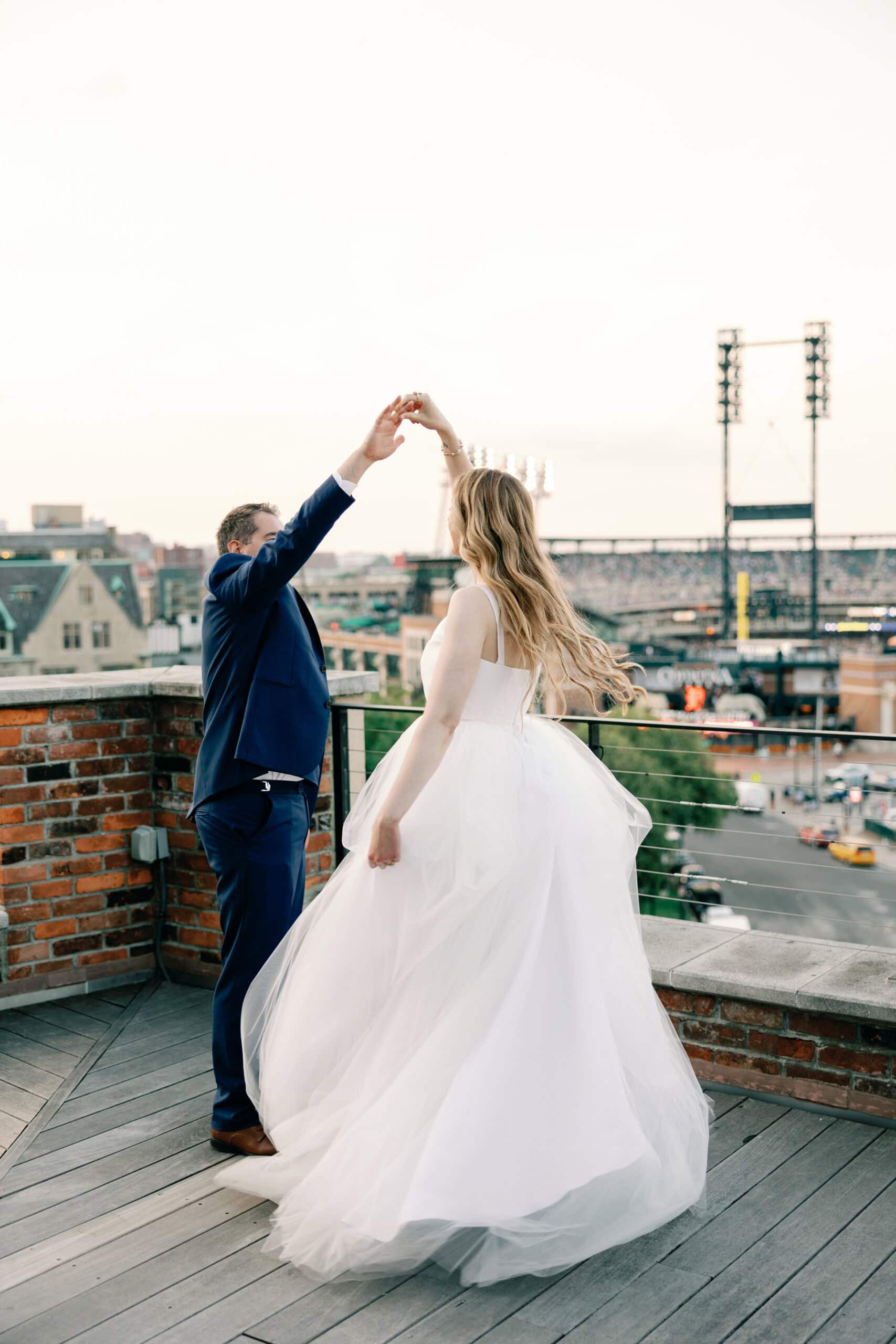 Couture Bride Ashley in Custom Sarah Kolis Gown and veil and groom 
