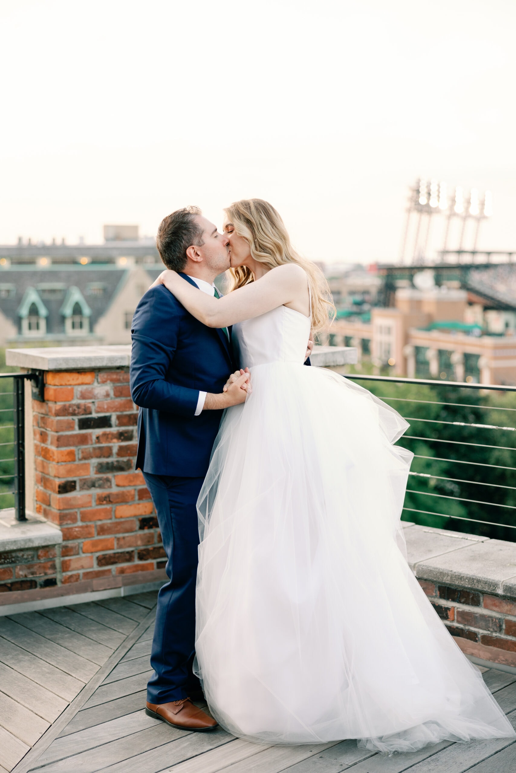 Couture Bride Ashley in Custom Sarah Kolis Gown and veil and groom 
