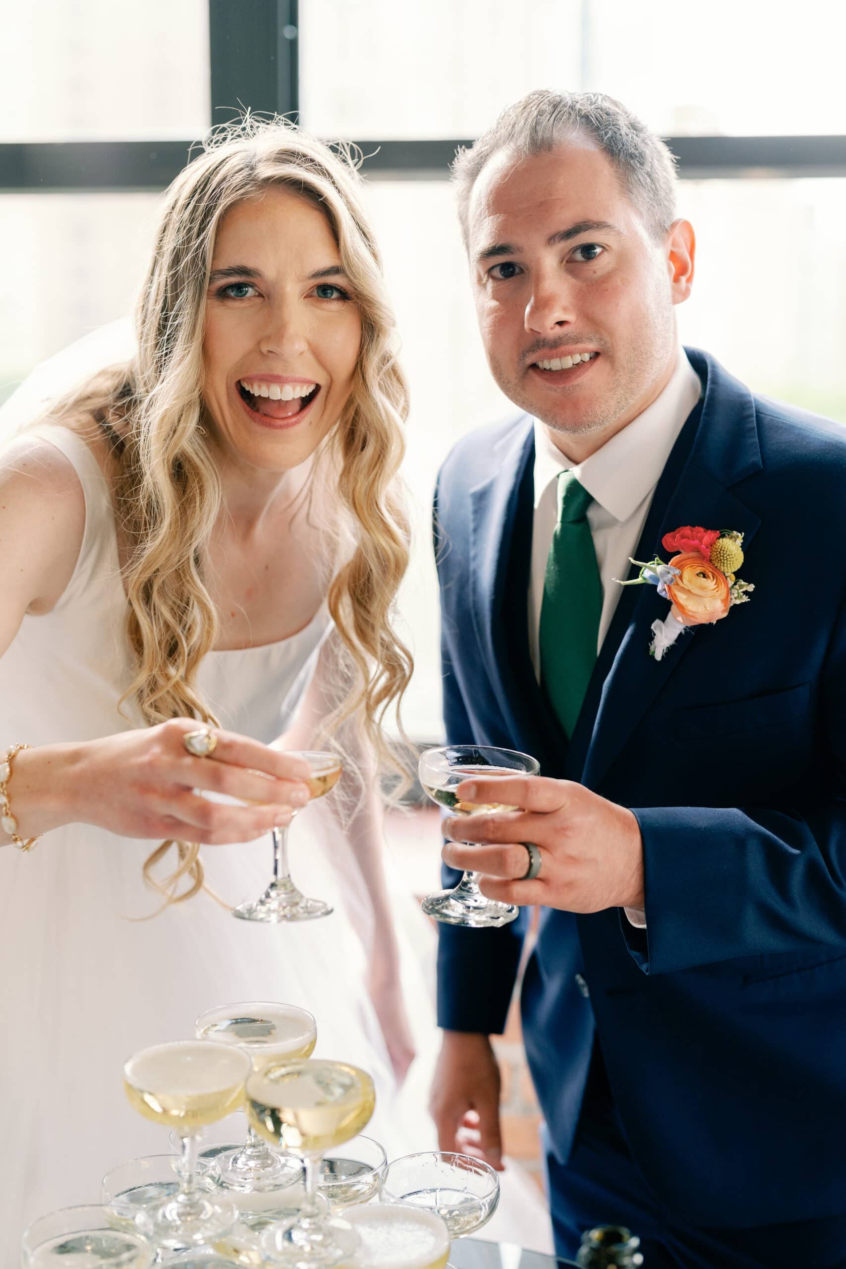 Couture Bride Ashley in Custom Sarah Kolis Gown and veil and groom 