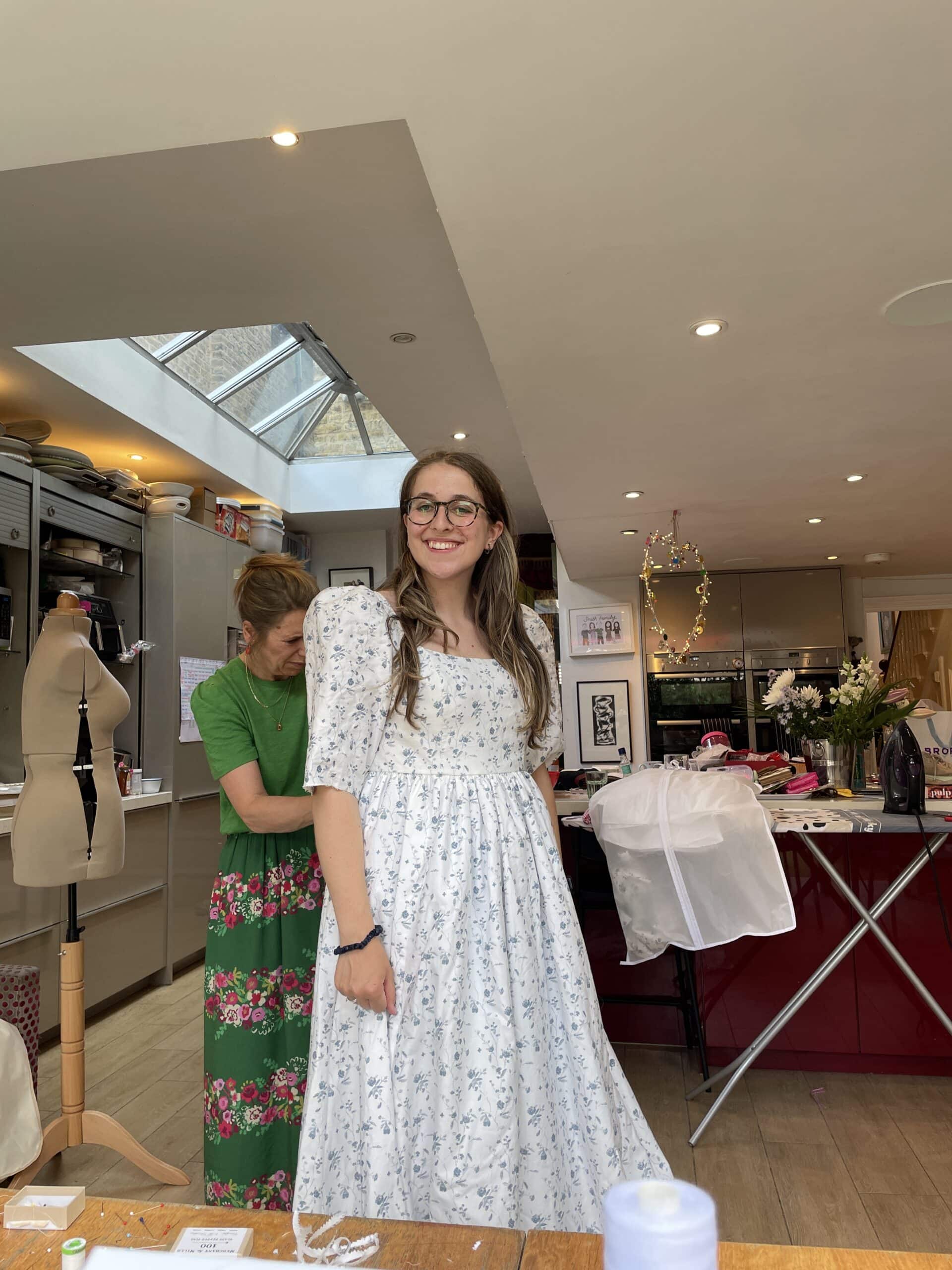 From Bedsheets to “The One”: A UK Bride’s DIY Sarah Kolis Couture Gown 21 Sophie helping with adjustments scaled