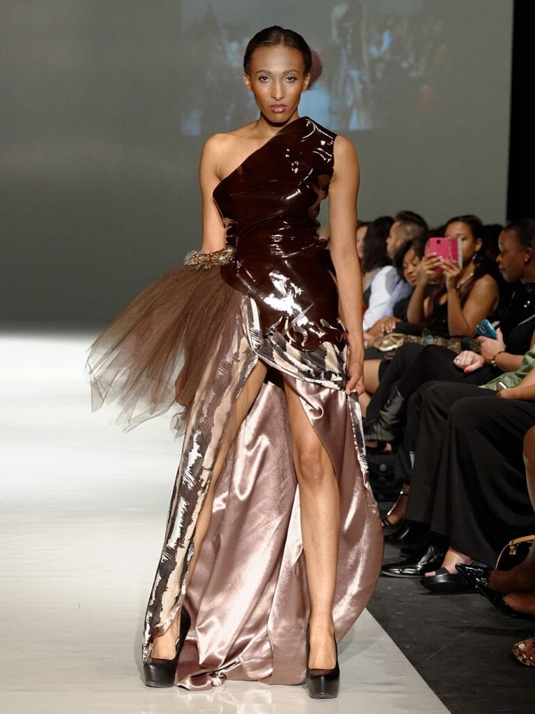 Winning the Emerging Designer Award at Fashion Week Las Vegas ;custom gown design and alterations; Sarah kolis; michigan wedding seamstress