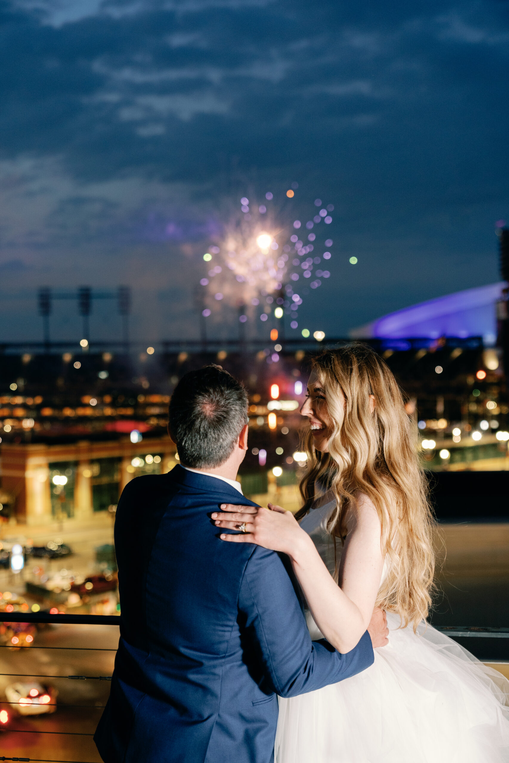 Couture Bride Ashley in Custom Sarah Kolis Gown and veil and groom fireworks